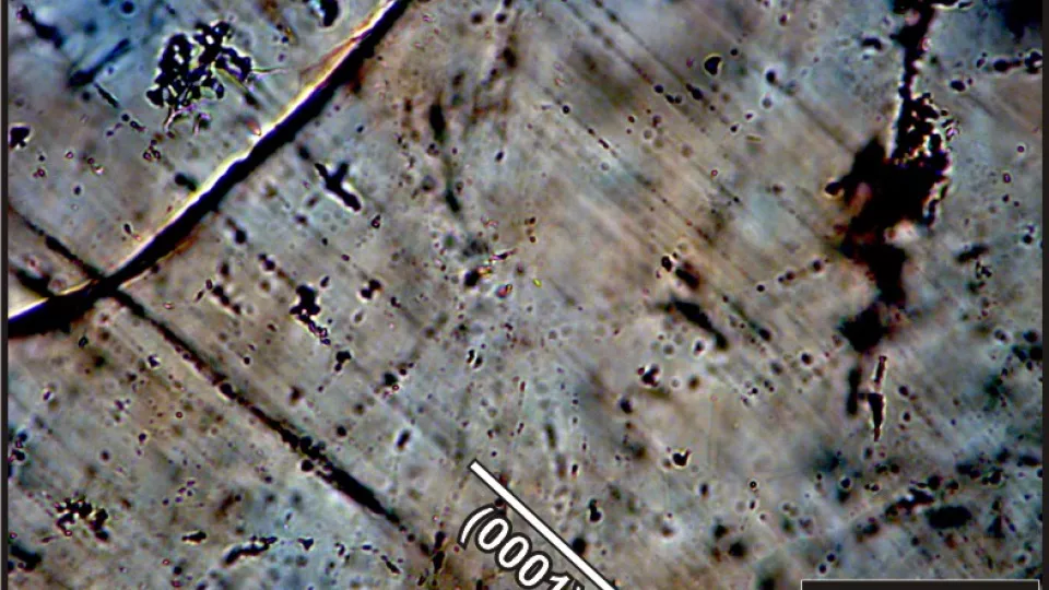 Photomicrograph of a shocked quartz grain from the Hummeln impact structure.
